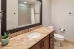 Additional bathroom with granite countertops 